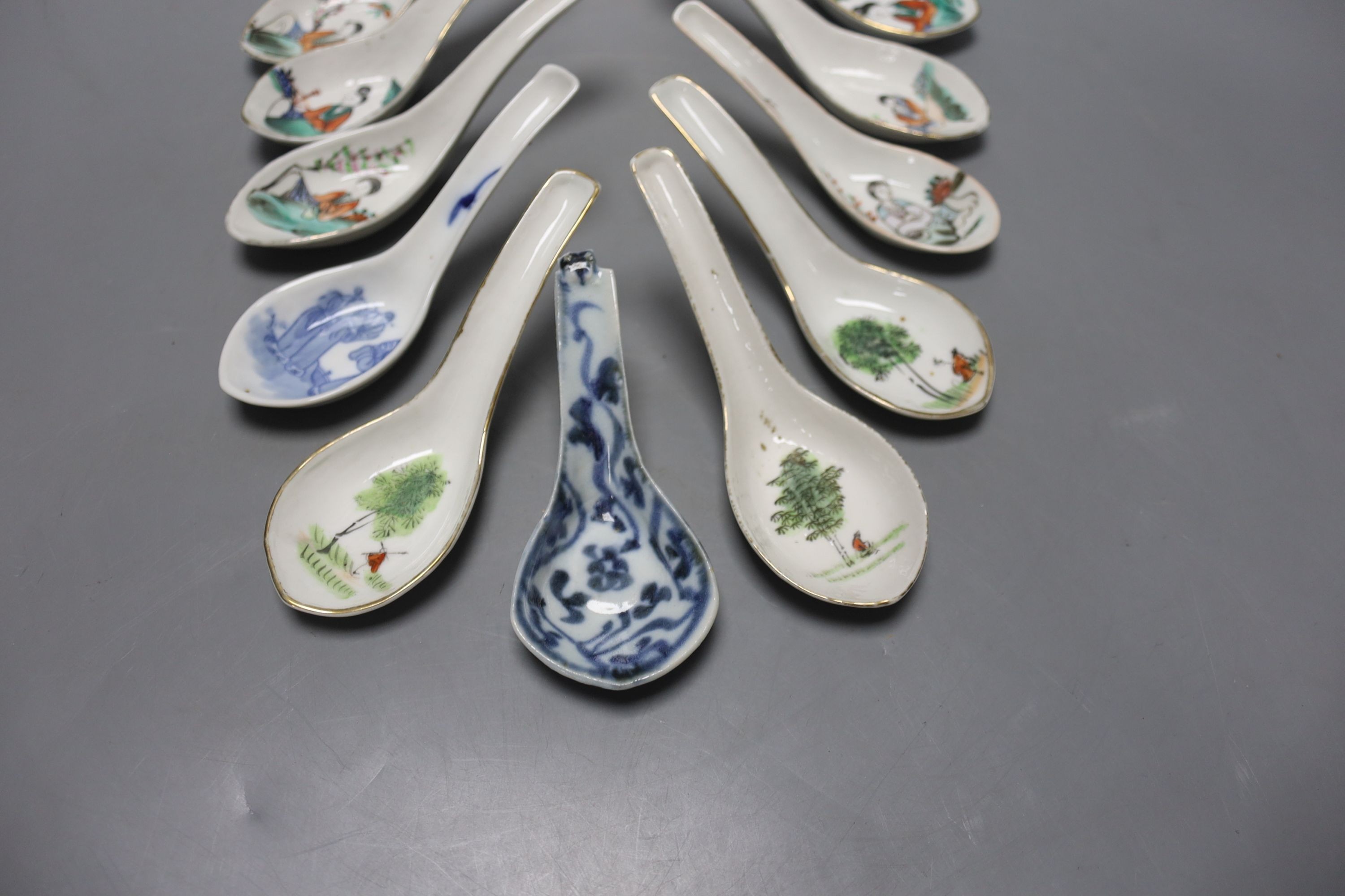 Eleven Chinese porcelain rice spoons, largest 15 cms long.